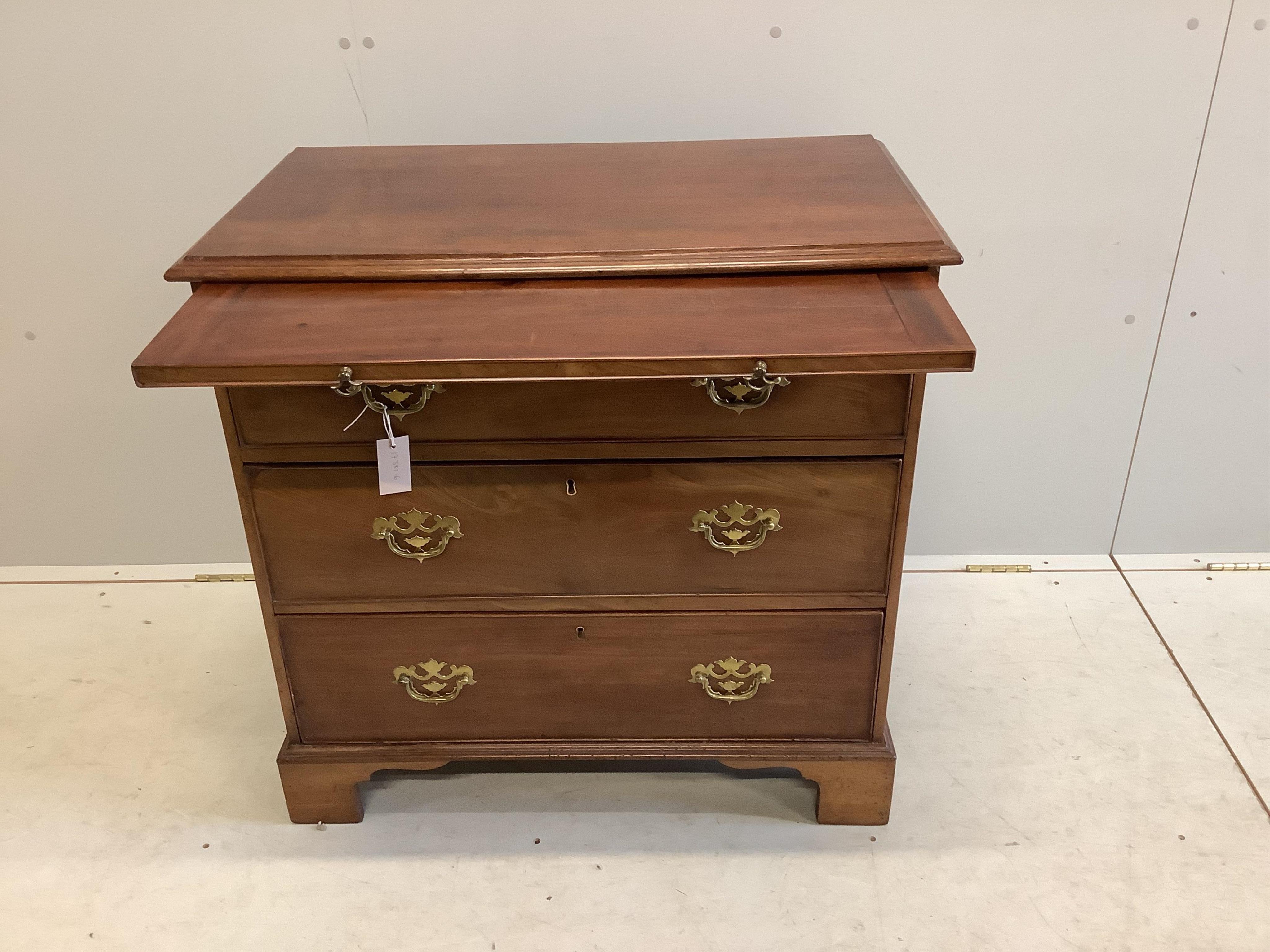 A small George III and later mahogany chest of drawers with a brushing slide, width 80cm, depth 45cm, height 79cm. Condition - fair